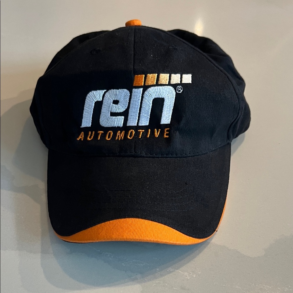 Rein Automotive Black and Orange Cap